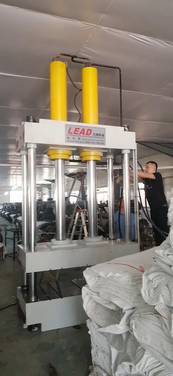 LEAD baling press compacting textiles at a recycling facility