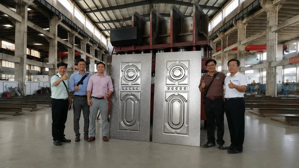 Customer delegation inspecting LEAD presses